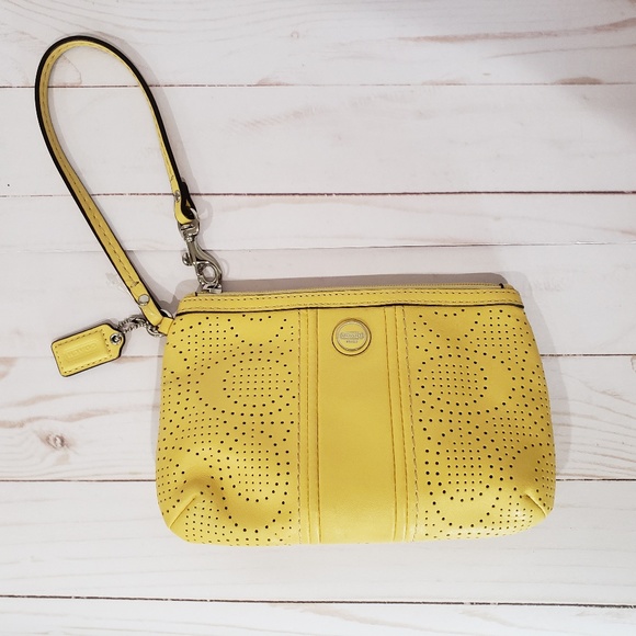 Coach Handbags - Banana Yellow Coach leather clutch wristlet
